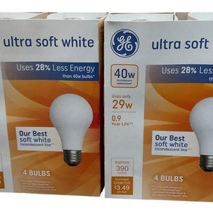 May include: Two boxes of GE Ultra Soft White light bulbs. Each box displays a 40W incandescent replacement bulb that uses only 29W and has a 0.9-year life. The boxes also state "Uses 28% Less Energy".