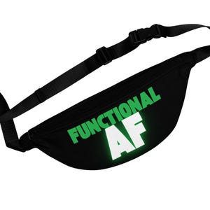 May include: Black fanny pack with the words "FUNCTIONAL AF" in green and white. The adjustable strap and buckle are black. The bag is designed to be worn around the waist or across the body.