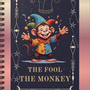 May include: Spiral-bound notebook featuring a colorful illustration of a monkey dressed as a jester. The monkey is smiling with its arms outstretched. The notebook cover has a dark blue background with the text "THE FOOL THE MONKEY".