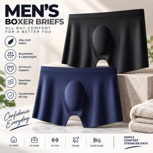May include: Two pairs of boxer briefs in black and navy blue, featuring a 3D pouch design and seamless construction. Text on the image includes MEN'S BOXER BRIEFS, ALL DAY COMFORT FOR A BETTER YOU, Confidence Everyday, and icons for daily activities.