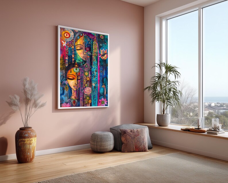 May include: A framed art print depicting a vibrant abstract portrait of two women. The artwork uses a palette of blues, pinks, yellows, and greens. The painting is displayed on a pink wall, with a vase, plant, and window in the background.