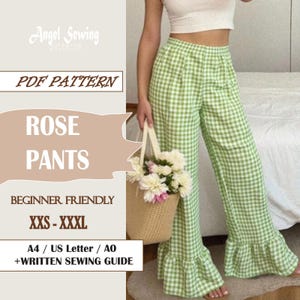 May include: Green and white gingham Rose pants with a ruffled hem. The image includes text that reads "Angel Sewing Patterns", "PDF Pattern", "Rose Pants", "Beginner Friendly", and "XXS-XXXL". A woven bag with flowers is held in the image.