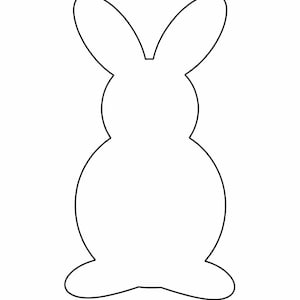 Puede incluir: Un contorno en blanco y negro de un conejo. El conejo tiene orejas largas y un cuerpo redondeado, con una pequeña cola. La imagen es un diseño simple y minimalista.