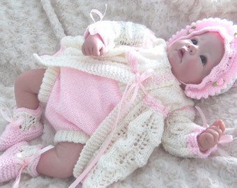 Beautiful knitting pattern to make this lovely reborn babies outfit