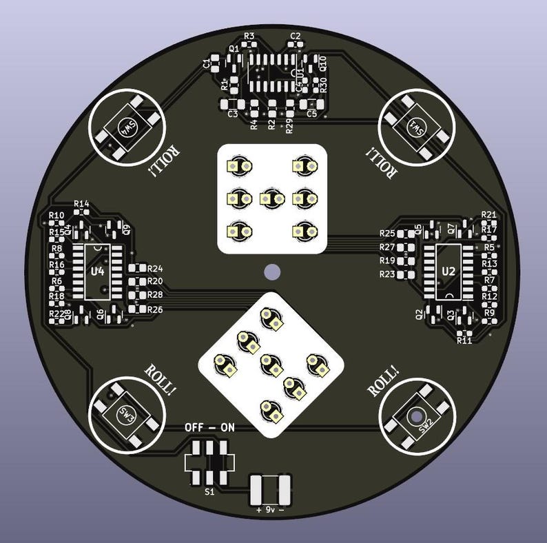 May include: A circular black circuit board with white components and text. The board features dice-shaped light arrays, integrated circuits, and the word "ROLL!" in white. It includes "OFF - ON" and "+9v -" labels.