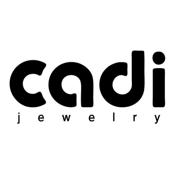 黒い石の付いたゴールドの指輪、代わりの婚約指輪、プロミス