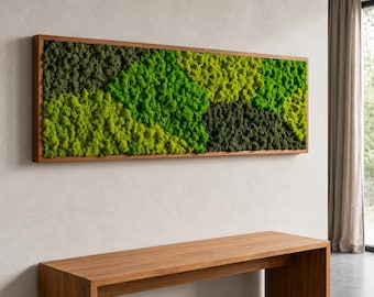 May include: A rectangular wall art piece featuring a dense arrangement of preserved moss in various shades of green, ranging from deep forest green to bright lime, encased within a simple, light-toned wooden frame with a clean, linear design.