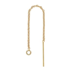 May include: Gold chain earring with a long, thin rod hanging from the bottom.
