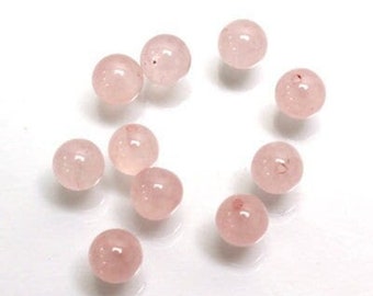 Half drilled natural rose quartz beads, sold by the pair