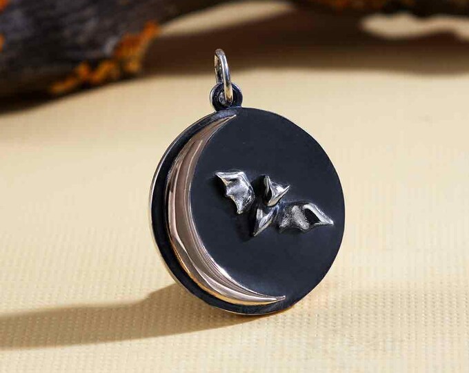 Mixed Metal Bat and Bronze Crescent Moon Charm