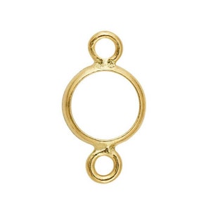 Peut inclure: Pendentif rond en métal doré avec deux anneaux de saut. Le pendentif est conçu pour être utilisé pour la fabrication de bijoux.