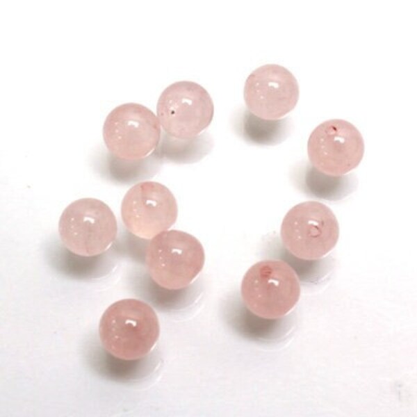 Half drilled natural rose quartz beads, sold by the pair