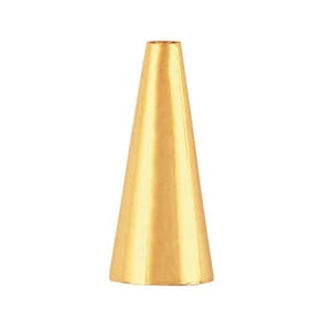May include: A gold-colored metal cone-shaped object.