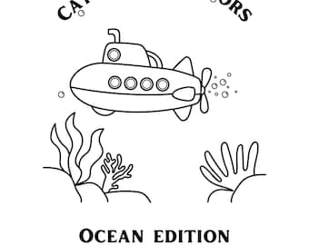 May include: Black and white line art illustration of a submarine with the text "Catch Me Outdoors" above it. Below the submarine is the text "Ocean Edition Coloring Book". The submarine has four portholes and a propeller.