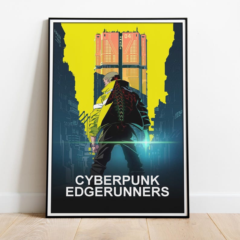 May include: A framed poster featuring a futuristic cityscape with a central figure in a yellow jacket. The poster has the text "CYBERPUNK EDGERUNNERS" at the bottom. The background is a vibrant yellow, with a tall building in the center.