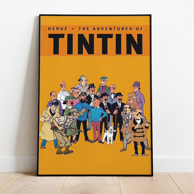 May include: A framed poster featuring a group of cartoon characters from "The Adventures of Tintin" against a yellow background. The title is in bold black letters above the characters. The characters are in various outfits.