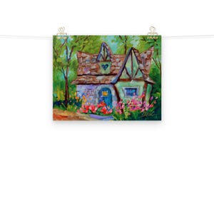 May include: A colorful painting of a whimsical cottage with a brown roof, blue door, and green trim. The cottage is surrounded by vibrant flowers and lush green trees. The artwork is signed "Beal".