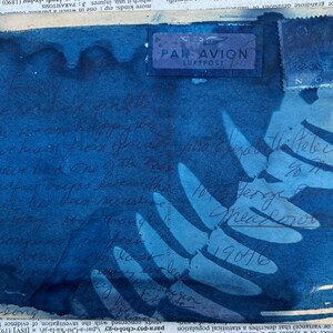 May include: A blue and white envelope with a stamp that says "Par Avion Luftpost" and a handwritten message that says "With regards to the telegram you sent me, I was happy to hear from you. The bracelet is on the way, I hope it gets there in time. I'll let you know when it's been sent. All the very best to you.  Sincerely,  19076"