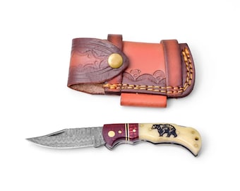 Cuchillo plegable de Damasco hecho a mano: mango de hueso, funda de cuero y varilla de afilar.