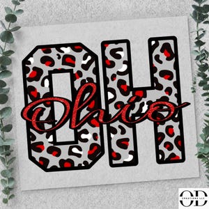 May include: A graphic design featuring the block letters OH filled with a grey, black, white, and red leopard print pattern. Overlaid across the center is the word Ohio written in a red glittery cursive script font with a black outline.