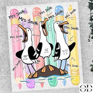May include: A graphic print featuring three white and black seagulls with open beaks standing on a small rock. Behind the birds are four vertical colored pencils in pink, purple, coral, and yellow. The text Mrs. Smith is repeated multiple times.