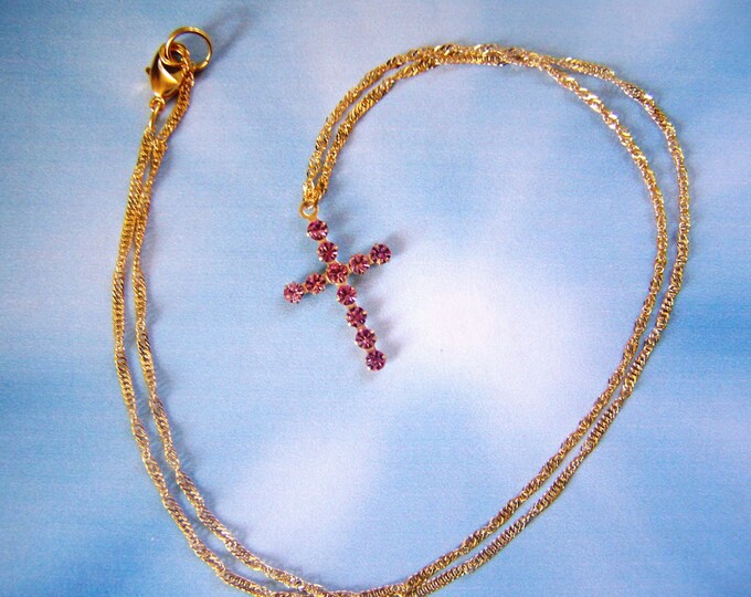 Vintage cross necklace on pink cord chain
