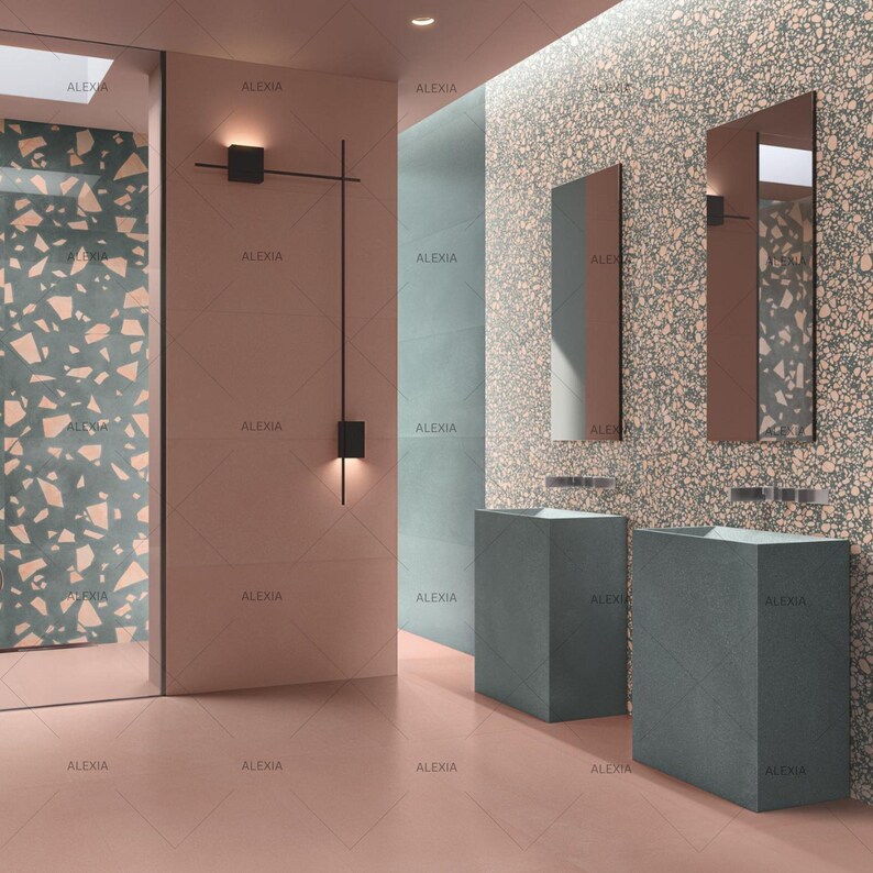 May include: A modern bathroom interior featuring a color palette of pink, teal, and gray. The space includes two gray pedestal sinks, rectangular mirrors, and a decorative wall light fixture. The walls have a terrazzo-like pattern.