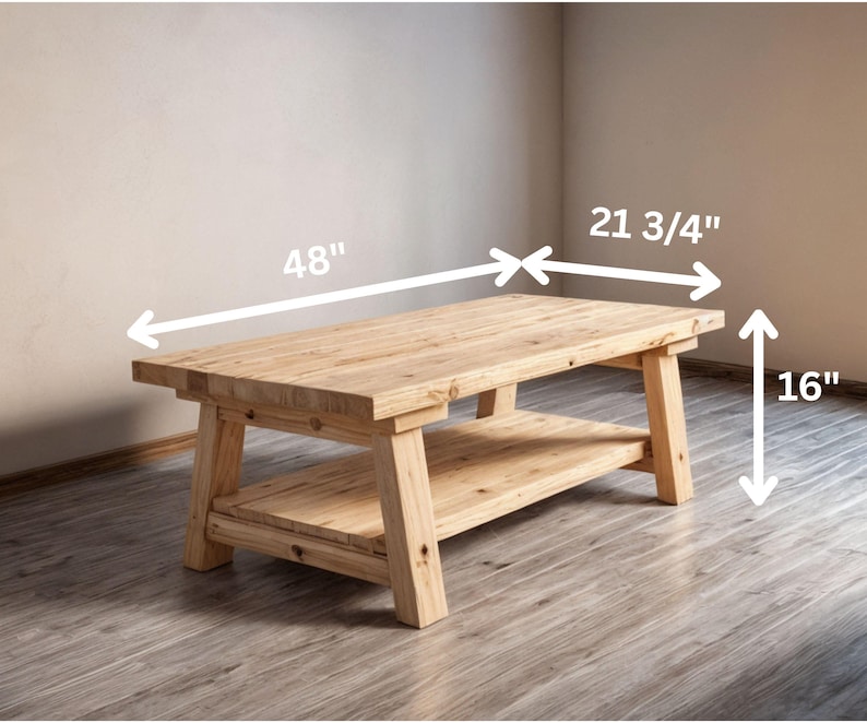 May include: A natural wood coffee table with a lower shelf. The table is 48 inches long, 21 3/4 inches wide, and 16 inches high. The table has a rectangular top and sturdy legs, showcasing a rustic design.