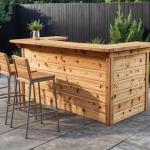 May include: A light brown wooden outdoor bar with a horizontal plank design and a flat countertop, accompanied by three matching wooden bar stools featuring silver metal frames and slatted backrests, with a small silver pitcher on the bar.