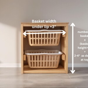 May include: A wooden storage unit with two beige plastic baskets. The text indicates how to measure the basket width and overall height. The baskets are designed to fit inside the unit.