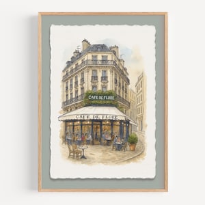 Puede incluir: Impresión en acuarela del Café de Flore en París. La obra de arte representa una escena callejera detallada con un toldo de café, asientos al aire libre y el nombre del café. La impresión está enmarcada en un marco de madera clara.