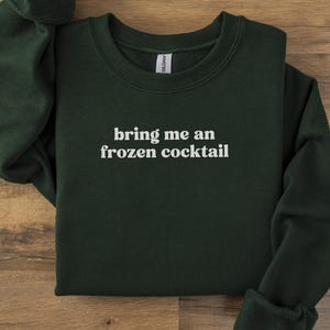 Bring me an frozen cocktail sweatshirt, cozy winter apparel, casual unisex pullover, comfortable weekend wear, funny hoodie
