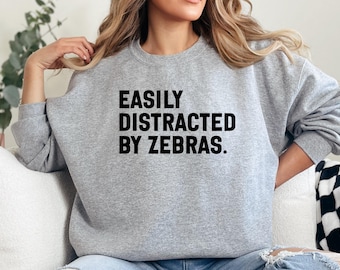 Easily Distracted by Zebras Sweatshirt, Funny Zebra Lover Gift, Animal Lover Apparel, Unique Graphic Sweatshirt, Zebra Obsessed Sweatshirt