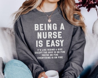Sudadera divertida de enfermera, Enfermería es fácil, Regalo para enfermeras, Sudadera con texto en inglés "Burning Bike", Dicho de enfermera, Sudadera con humor de enfermera, Agradecimiento a las enfermeras