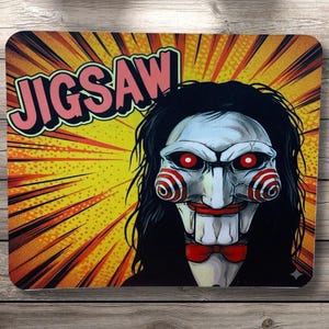 May include: A set of three ceramic mugs with a speckled, matte finish. The mugs are in shades of cream, light gray, and dark gray. Each mug has a simple, modern design and a rounded handle. The mugs are stacked on top of each other.