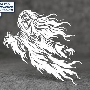 May include: A white vinyl decal featuring a stylized illustration of a screaming ghost with long flowing hair, outstretched arms, and clawed hands. The design depicts the figure in a dynamic, forward-reaching pose with tattered, wispy edges.