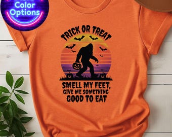 Trick or Treat Bigfoot-T-shirt: grappige Halloween Sasquatch-afbeelding