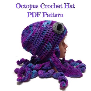 May include: Octopus Crochet Hat PDF Pattern. A purple and blue variegated yarn crochet hat shaped like an octopus with large gray and black eyes and dangling tentacles. Text reads: Octopus Crochet Hat PDF Pattern. This is a PDF crochet pattern.