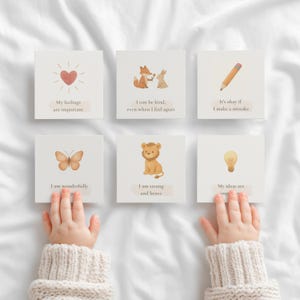 May include: Six square cards with illustrations and text. The cards feature a heart, fox and rabbit, pencil, butterfly, lion, and lightbulb. Text includes "My feelings are important," "I can be kind," and "I am strong and brave."