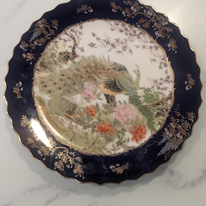 Vintage Japanese peacock decorative plate - Handcrafted, porcelain art- collectible wall decor.