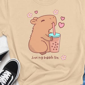 Capybara Bubble Tea T-Shirt: Hearts & Floral Design, Comfort Wear