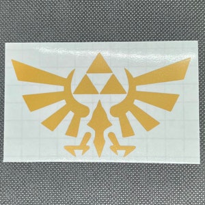 ゼルダの伝説 翼のトライフォース ビニールステッカー – 精密カット ゲーマーデカール | ノートパソコン、車、タンブラーに防水・UV耐性