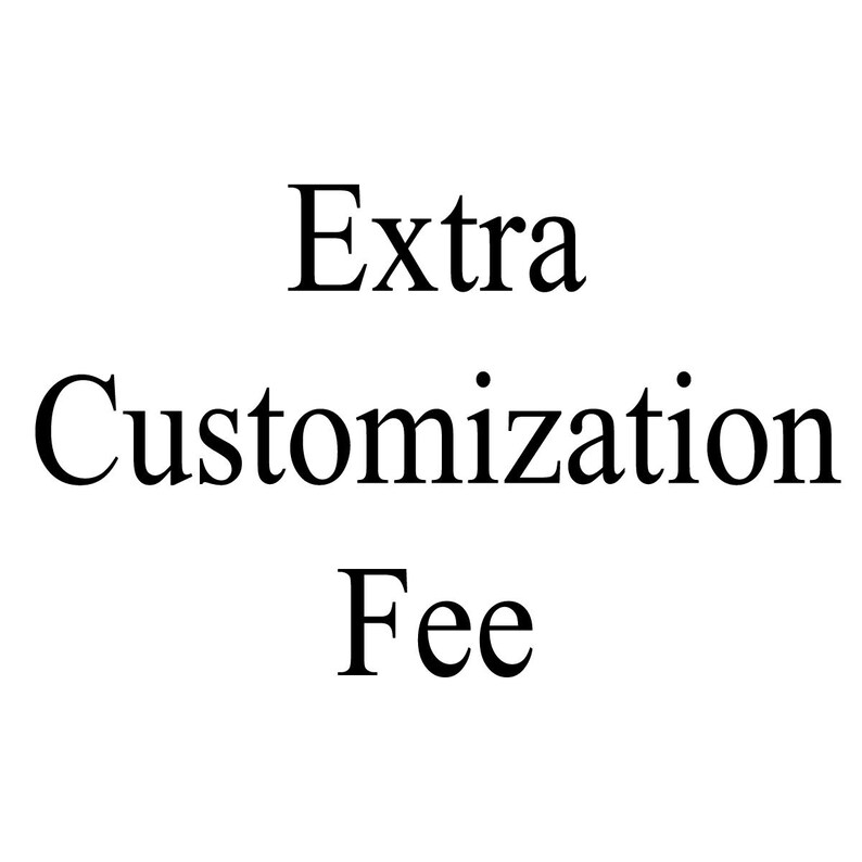 May include: White background with the words "Extra Customization Fee" in a black, serif font. The text is arranged in three lines, with "Extra" at the top, "Customization" in the middle, and "Fee" at the bottom.