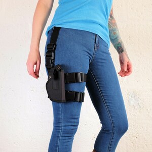 Side view of a woman wearing a Jill Valentine thigh holster by Vontoon made from durable polypropylene and strong plastic buckles