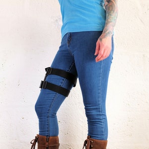 Side view of a woman wearing a Jill Valentine thigh holster by Vontoon made from durable polypropylene and strong plastic buckles