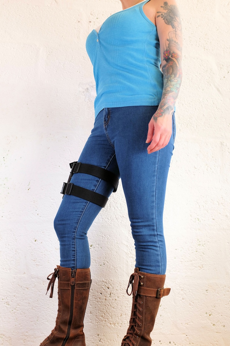 Side view of a woman wearing a Jill Valentine thigh holster by Vontoon made from durable polypropylene and strong plastic buckles