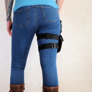 Back view of a woman wearing a Jill Valentine thigh holster by Vontoon made from durable polypropylene and strong plastic buckles