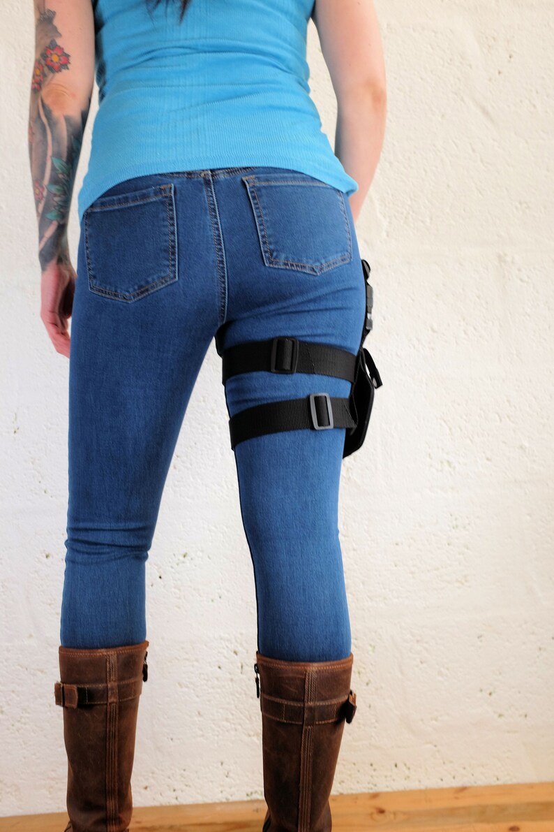 Back view of a woman wearing a Jill Valentine thigh holster by Vontoon made from durable polypropylene and strong plastic buckles