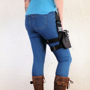Back view of a woman wearing a Jill Valentine thigh holster by Vontoon made from durable polypropylene and strong plastic buckles