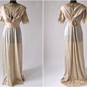 May include: A vintage ivory silk wedding dress with a lace bodice and a long flowing skirt.